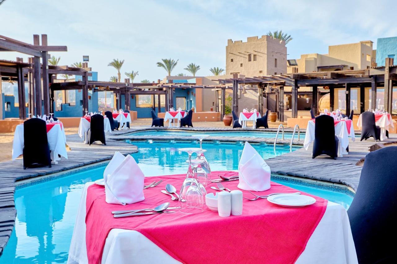 Pickalbatros Sands Port Ghalib Exterior foto The pool at the hotel